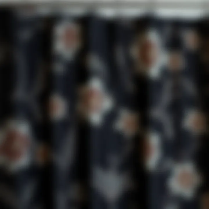 Close-up of intricate floral patterns on a black shower curtain