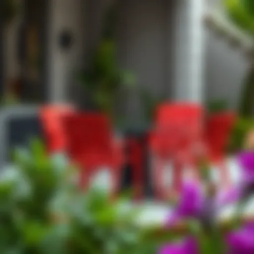 Elegant red stacking patio chairs arranged around a modern outdoor table.