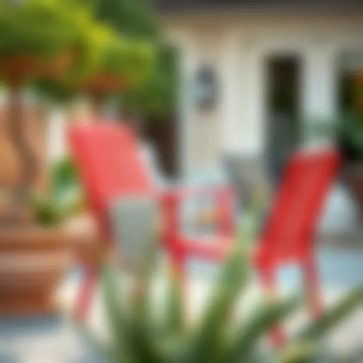 A well-maintained red stacking patio chair on a serene patio.