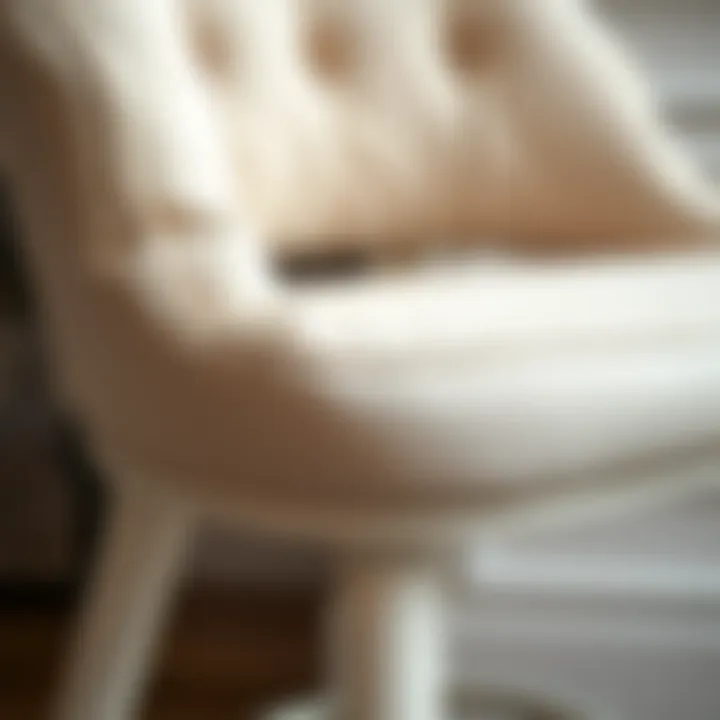 Detail of Luxurious Fabric on White Counter Height Chair Close-up of luxurious fabric details on a white counter height chair