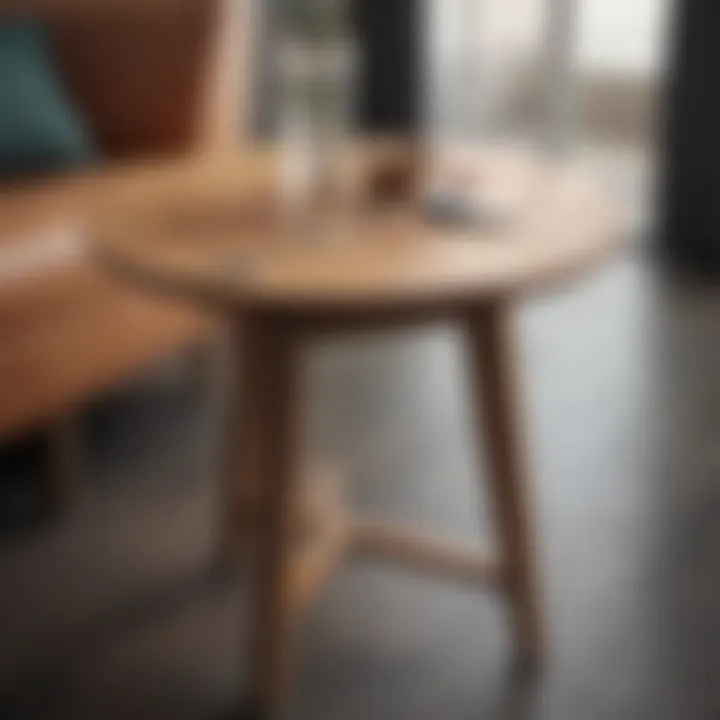 Close-up of a round end table made from natural wood